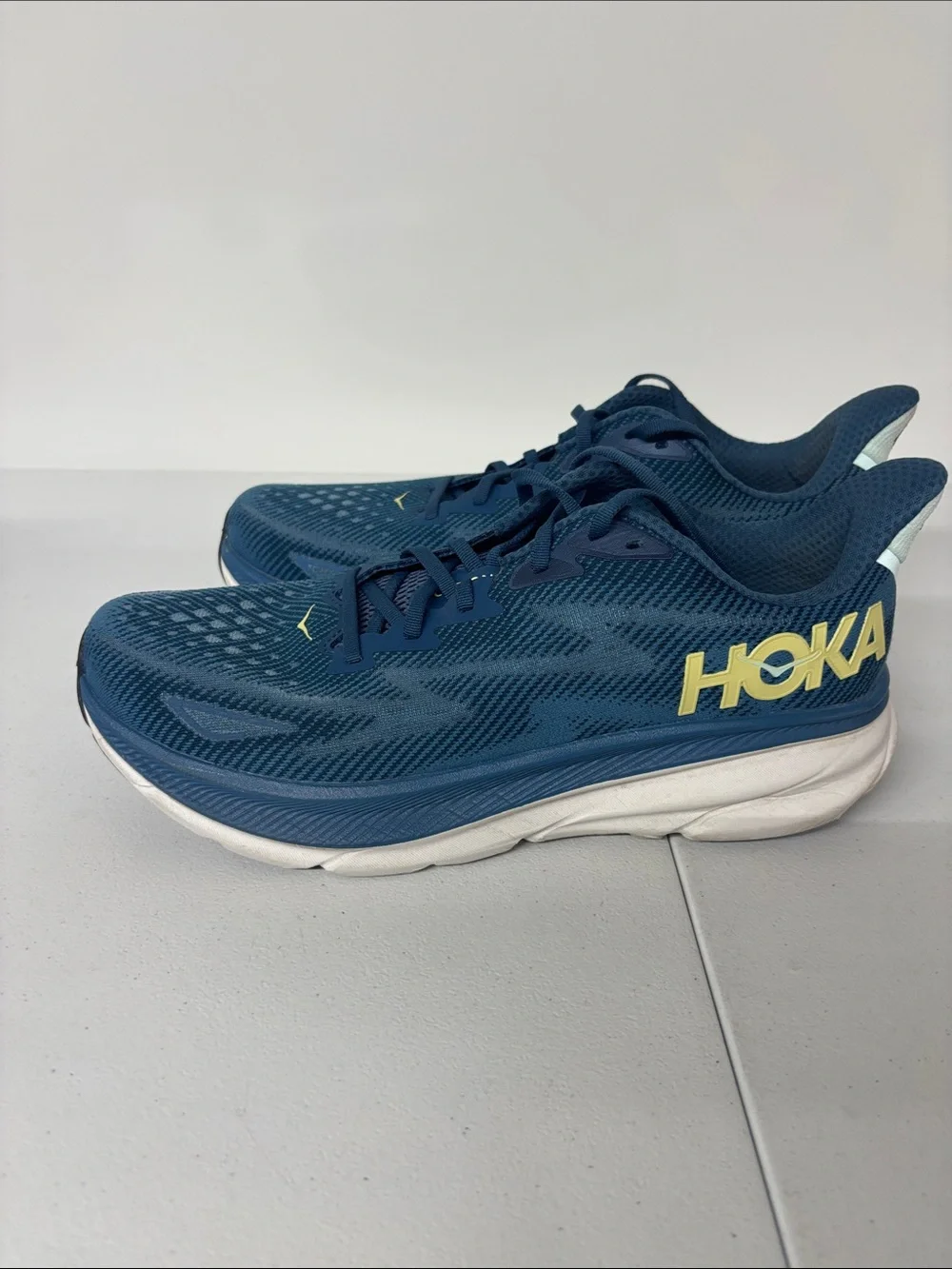 Hoka Blue Running Shoes with Yellow Logo